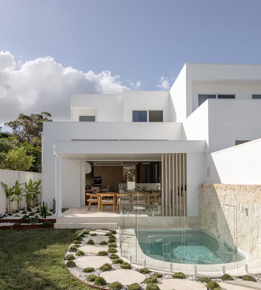 Rear of the duplex with a plunge pool and stepping-stone garden