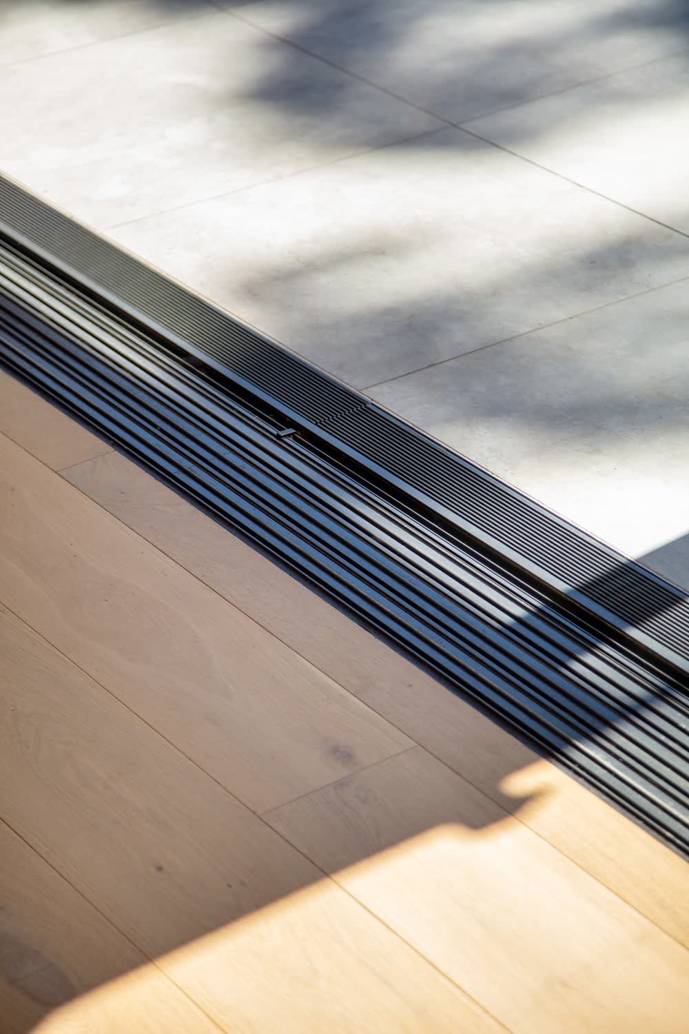 Flush sliding door track