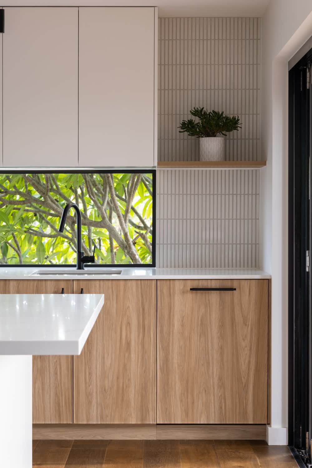 Strip window splashback over the sink